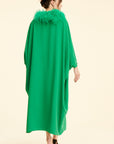 SAAHN model showcasing emerald green kaftan