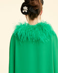 Luxurious SAAHN Ostrich Emerald Green Kaftan, showcasing design.